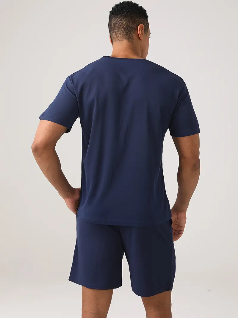 Rahat Baskılı Üç Mevsim Spor Takımı Grafik ve Harf Tasarımı ile 2 Parça Set Polyester Kumaş Hafif Esnek