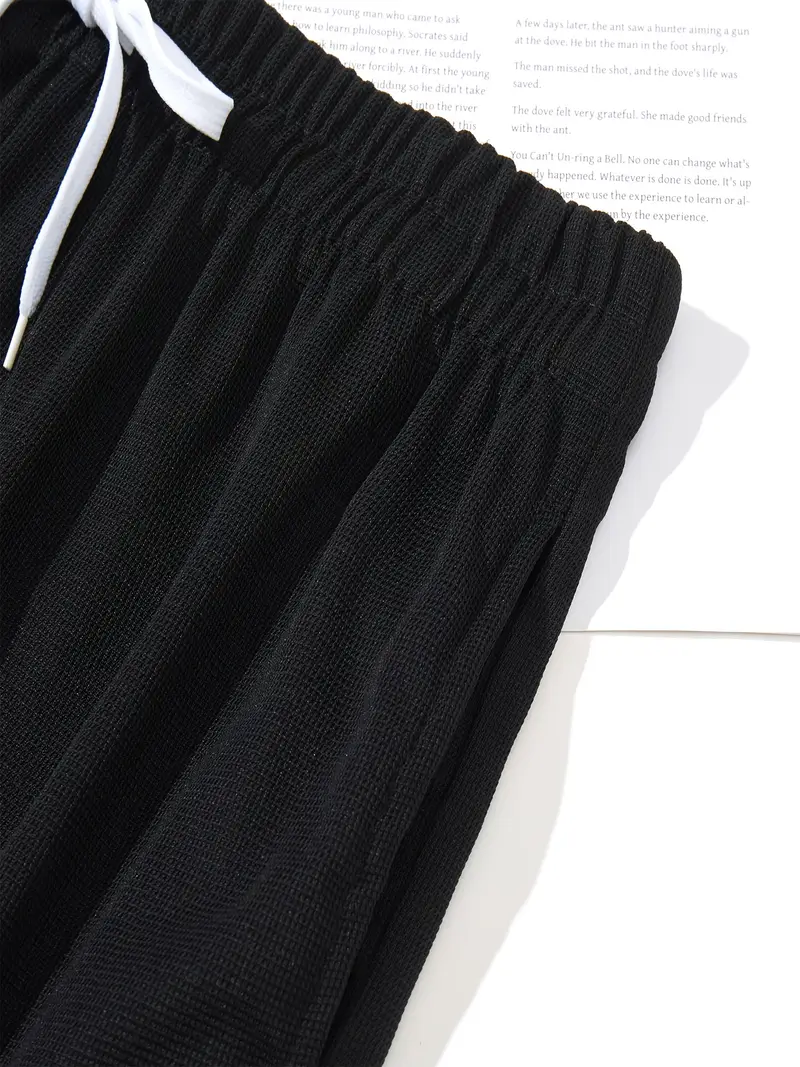 Rahat Baskılı Üç Mevsim Spor Takımı Grafik ve Harf Tasarımı ile 2 Parça Set Polyester Kumaş Hafif Esnek